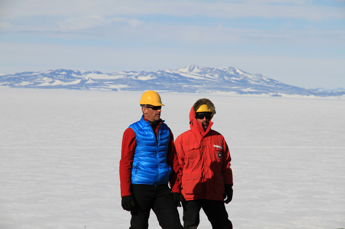 Photo of John Hamelmann and Jody Ellis (Hamelmann Communications) at the CosRay site overlooking McMurdo Sound