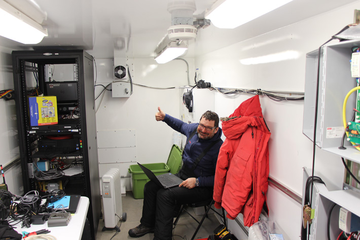 Photo of Mike in the AMF container at WAIS Divide on 6 December 2015, after getting the SKYRAD sun tracker working