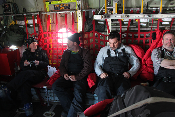 Photo of Team airborne in the LC-130 on the way to WAIS Divide, 2 December 2015. Left to right: Kat Ryan (ASC Weather Observer), Colin, Mike, Dan