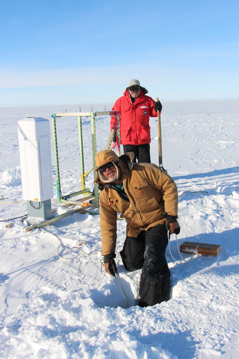 Photo of Colin and Dan installing dead-man anchors for the ceilometer and Total Sky Imager at WAIS Divide - 5 December 2015