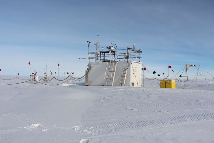 Photo of : AMF equipment at WAIS Divide. Left to right: Total Sky Imager (TSI) and Ceilometer, Microwave radiometer (MWR) farther back by itself, the container with most of the instruments and data system, liquid nitrogen supply (yellow crates) for the GVRP microwave profiling radiometer, and the GNDRAD system